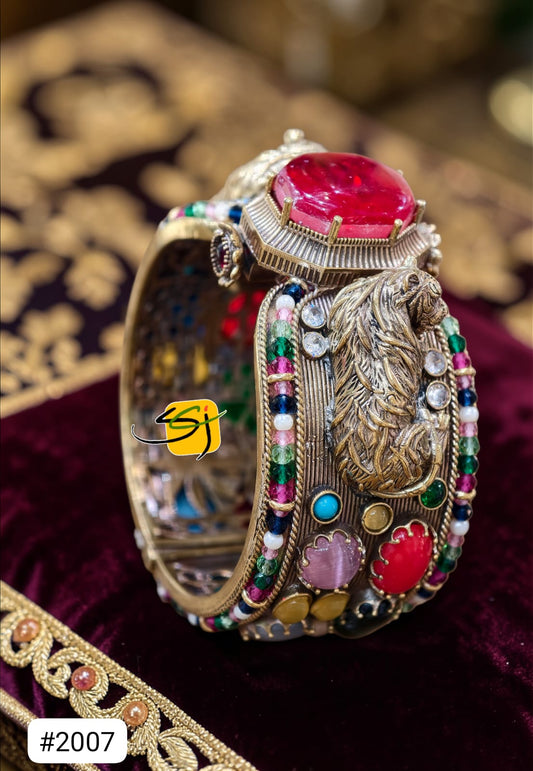 Dual-Tone Peacock Multicolor Gemstone Bangle with Ruby Centerpiece